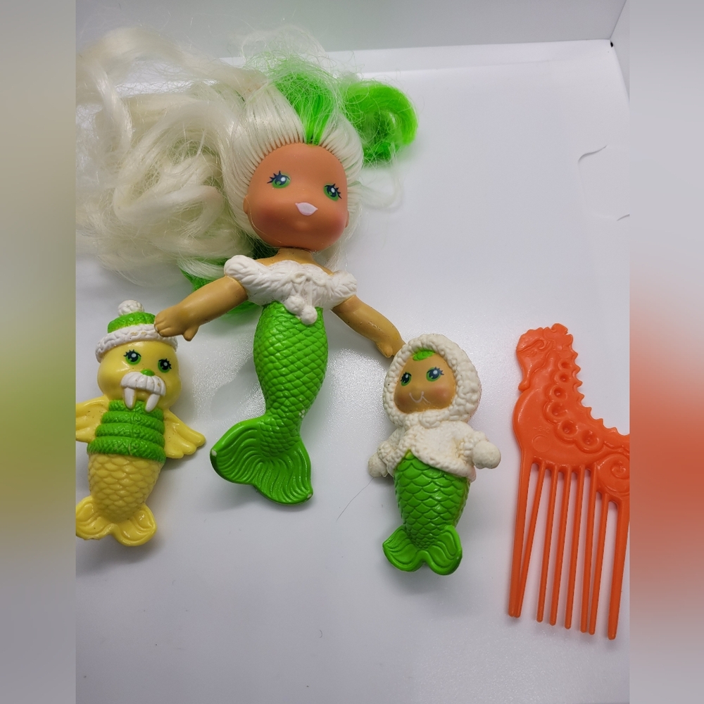 Vibrant Green and Orange Doll Collection with Accessories